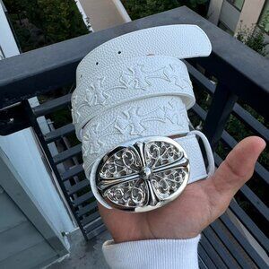 chrome buckle with white crosses belt